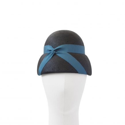 AUDREY cloche hat in black parasisol straw with blue ribbon